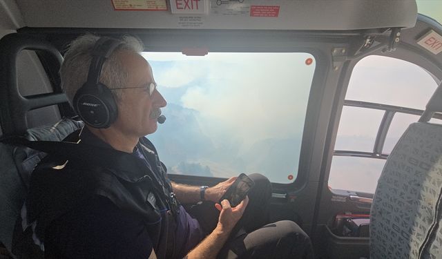 Bakan Uraloğlu, Bursa'daki yangın bölgesini havadan inceledi