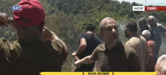 sozcu-tv-muhabirinin-hatayda-yangin-provokasyonu-al-iste-hortum-burad54624626_d85e875d3e42aab95d733af5b64f28b1.jpg